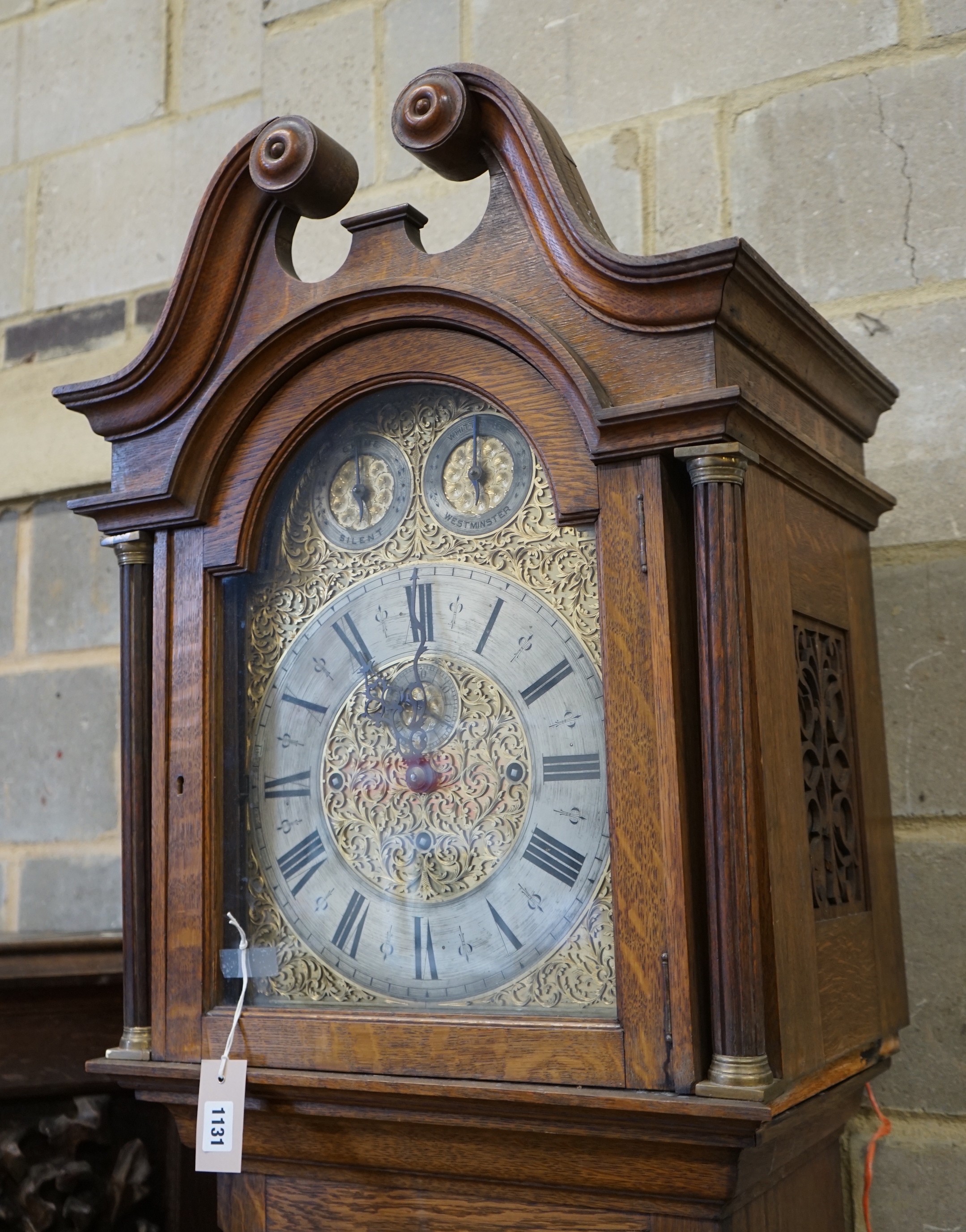 An early 20th century oak Westminster chiming 8 day longcase clock, height 236cm